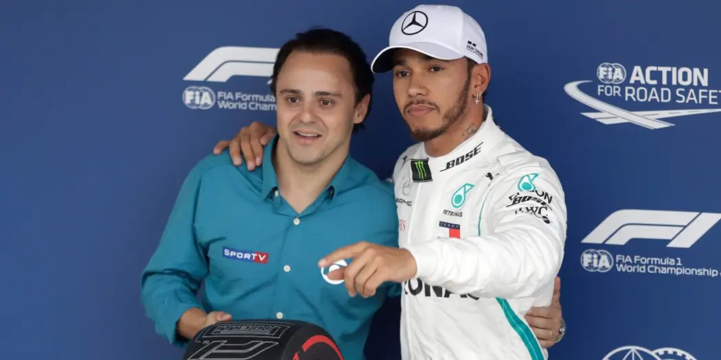 Felipe Massa giving Lewis Hamilton the Grand Prix qualifications prize