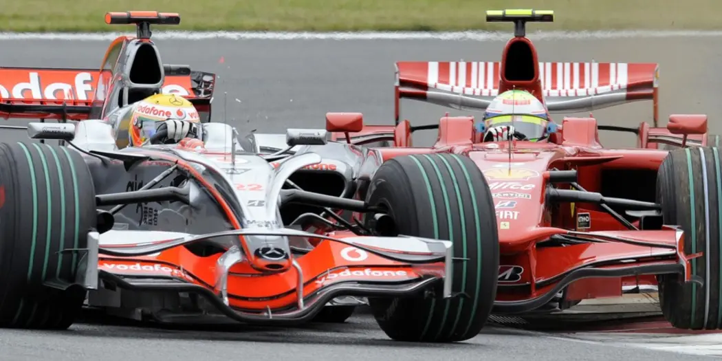 Felipe Masa and Lewis Hamilton "fighting" on track