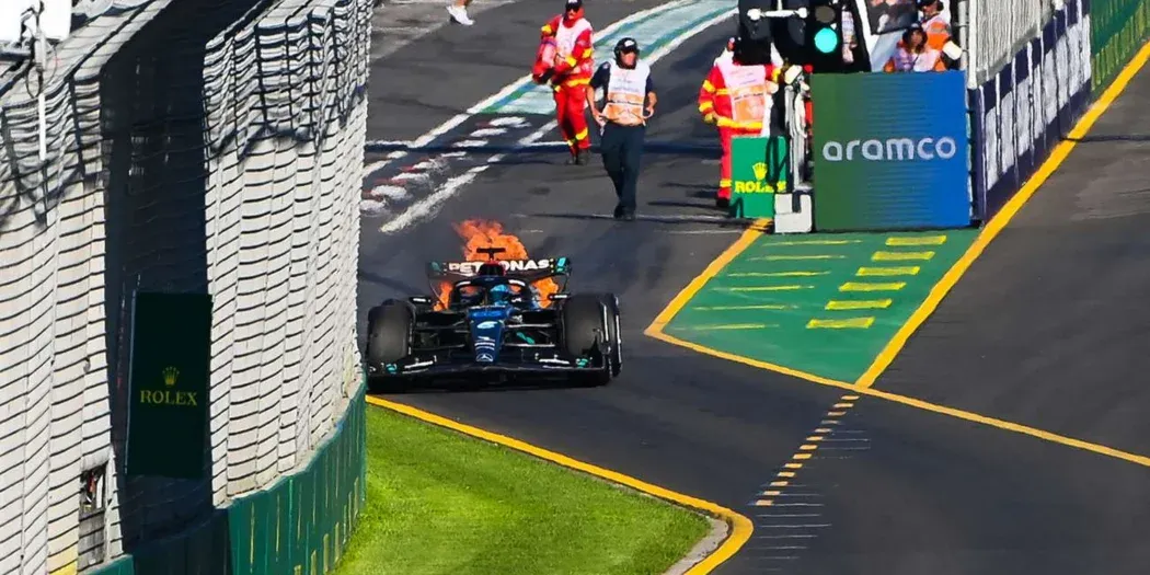 George Russell's car in flames during Australian GP 2023