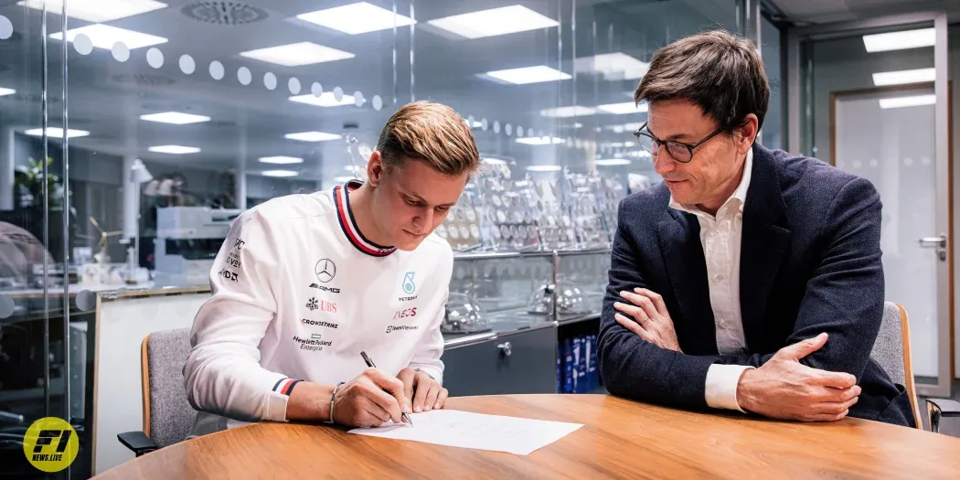 Toto Wolff and Mick Schumacher signing the contract as Reserve Driver for 2023 - Mercedes