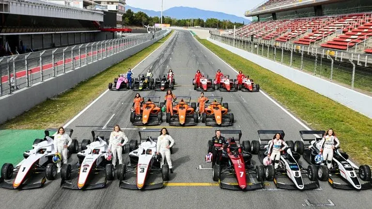 All the drivers lined up next to their cars for the first season of f1 academy (Image Credit: F1 Academy)