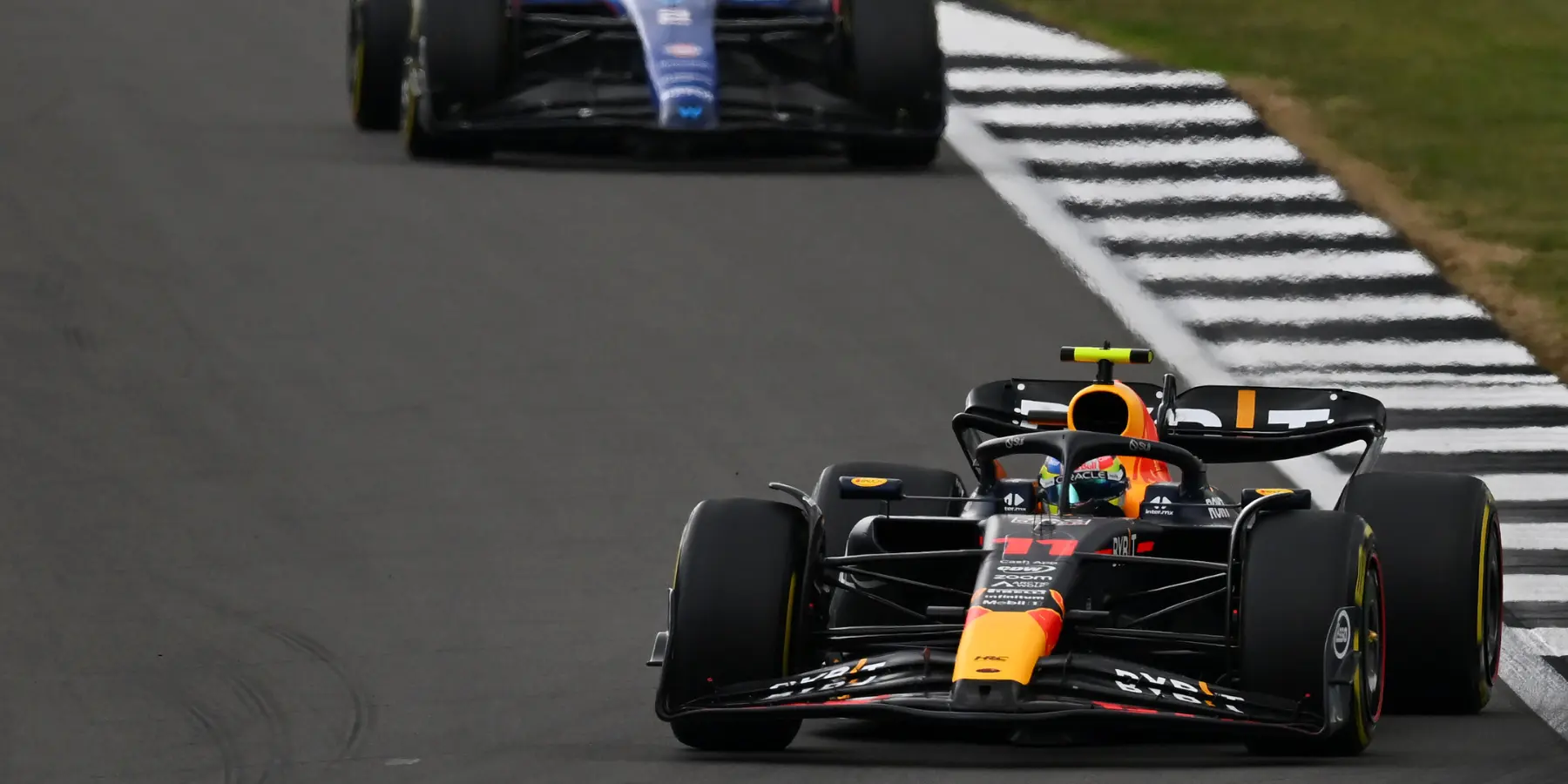 Sergio Perez and Alex Albon at the 2023 British Grand Prix-Red Bull Content Pool