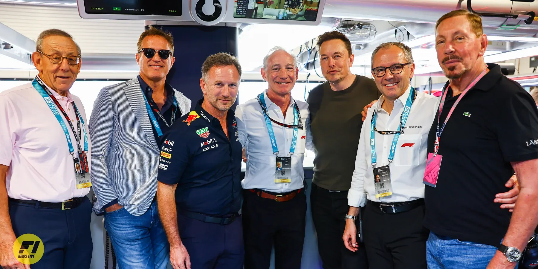 Stefano Domenicali and Elon Musk on Red Bull's garage -Stefano Domenicali Christian Horner and Elon Musk at the Red Bull Garage-Red Bull Content Pool 