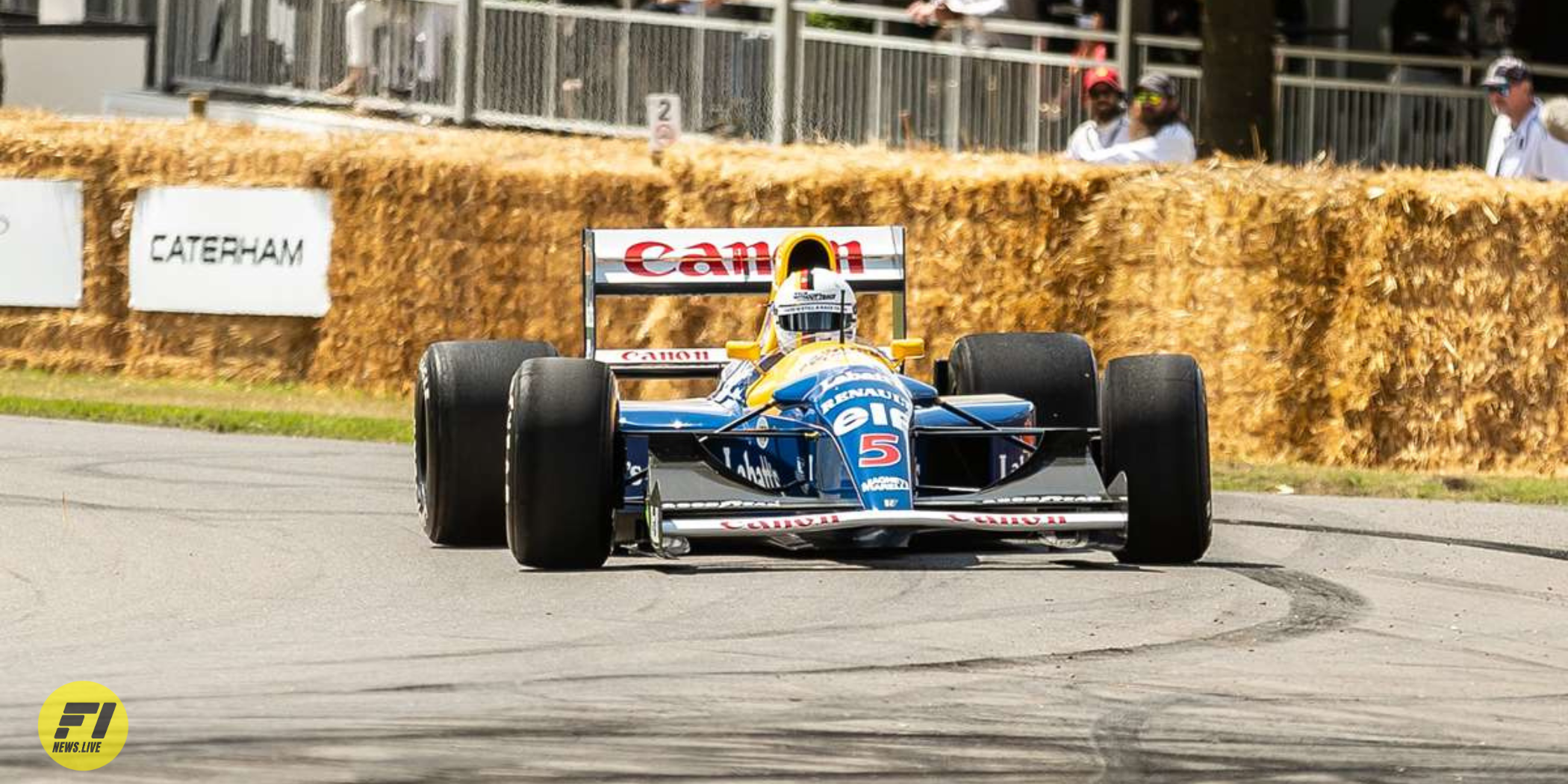 Sebastian Vettel driving is Williams at 2023 Goodwood festival