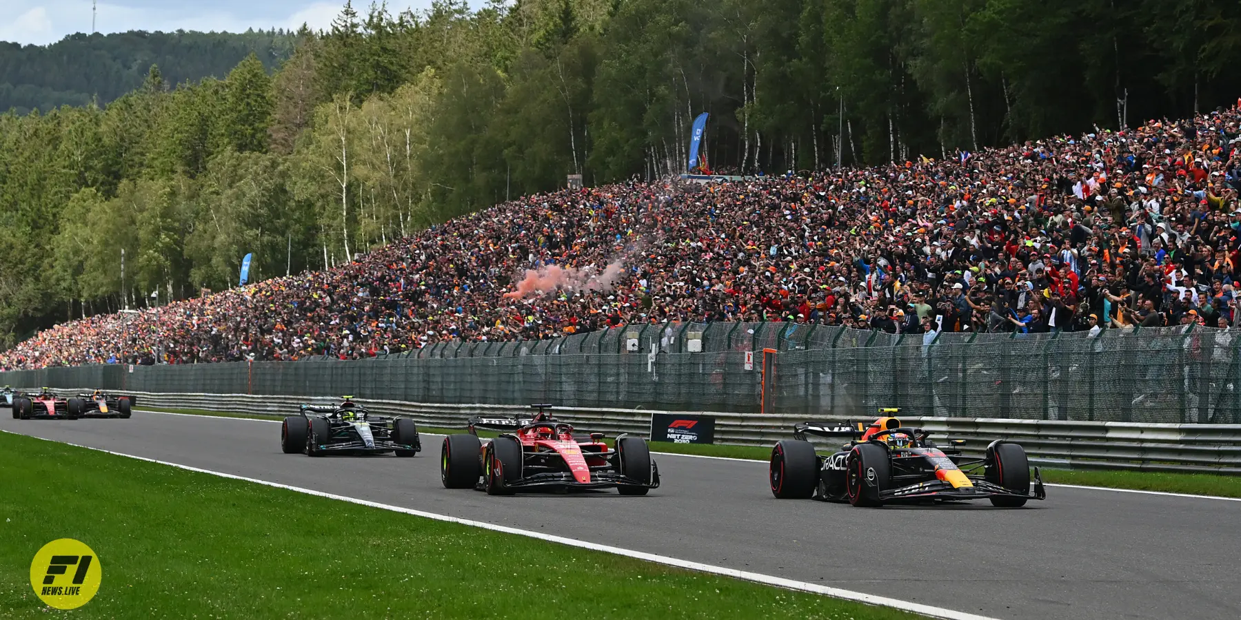 Sergio Perez overtaking Charles Leclerc at the 2023 Belgian GP-Red Bull Content Pool