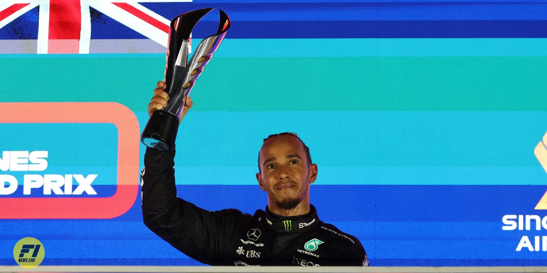 Lewis Hamilton on podium during the 2023 Singapore Grand Prix