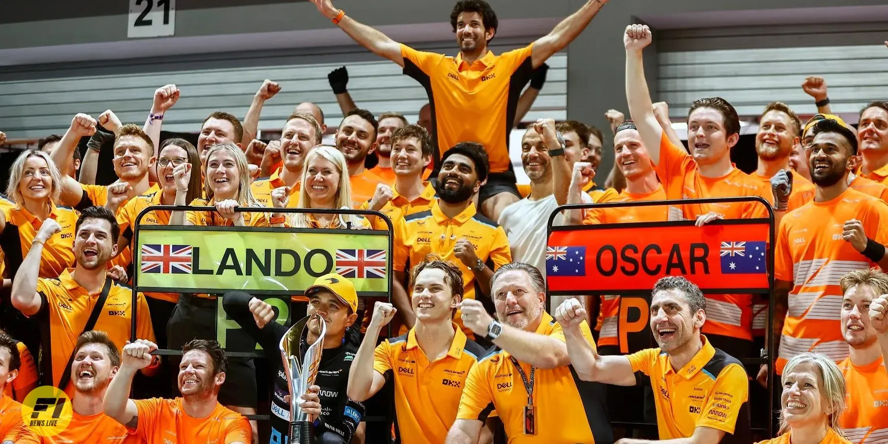 McLaren team celebrating Norris and Piastri podiums in Japanese GP 2023