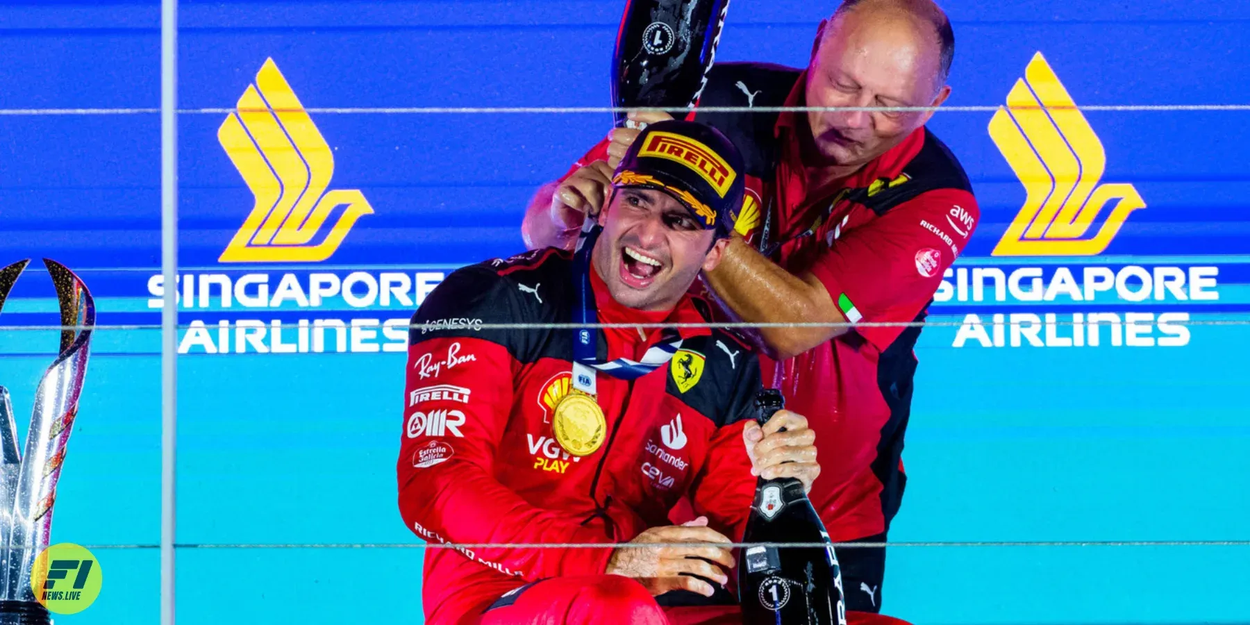 Carlos Sainz and Frederic Vasseur celebrating Singapore GP 2023 win