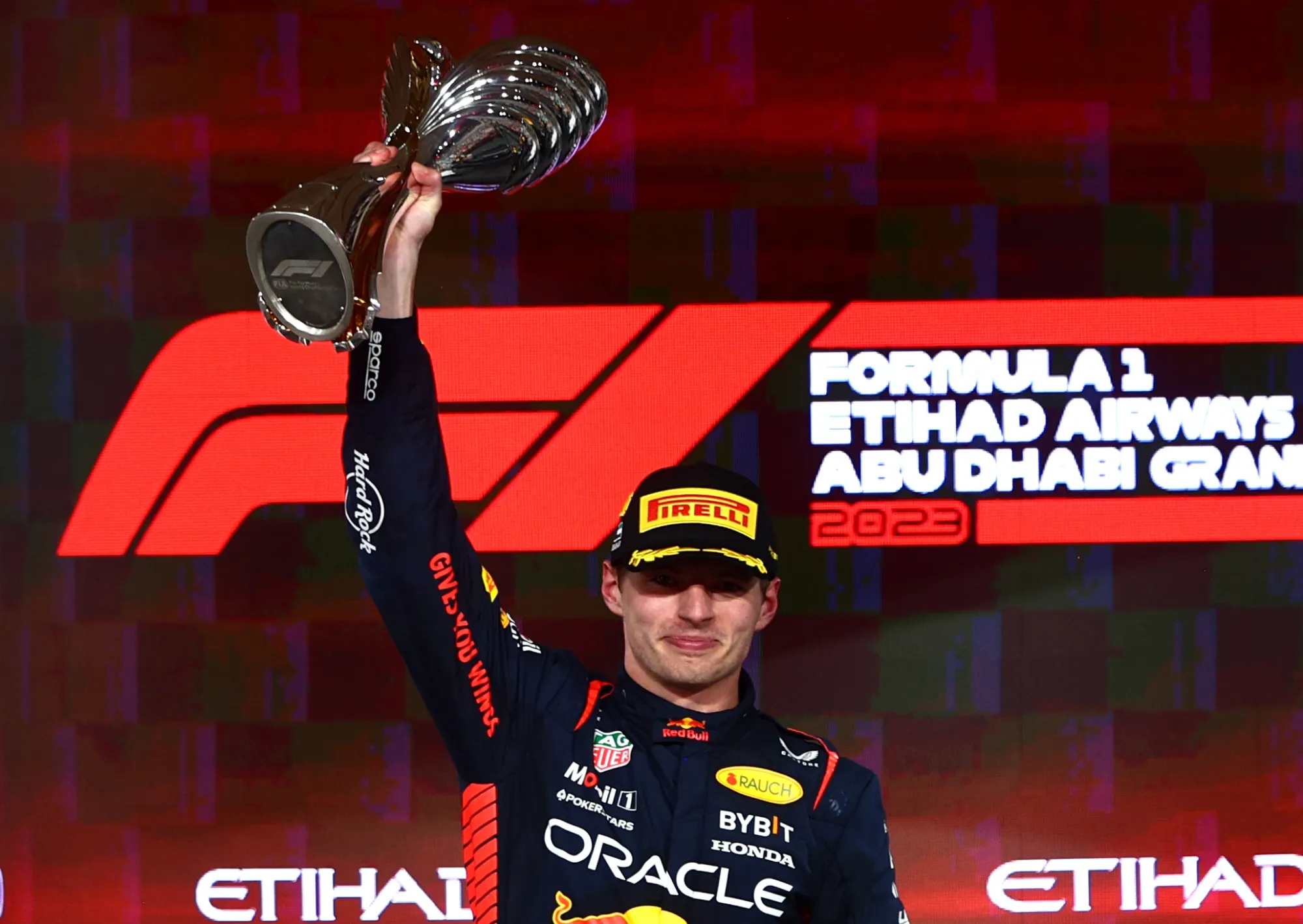 Max Verstappen on the podium of the 2023 Abu Dhabi GP-Red Bull Content Pool