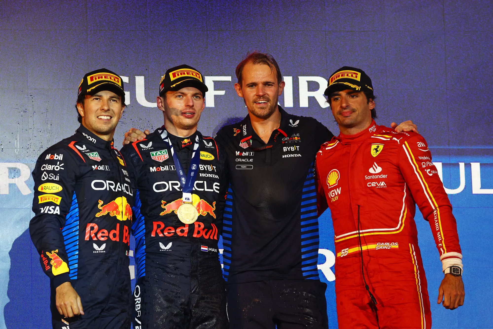 Sergio Perez, Max Verstappen Tom Hart Red Bull Performance Engineer and Carlos Sainz