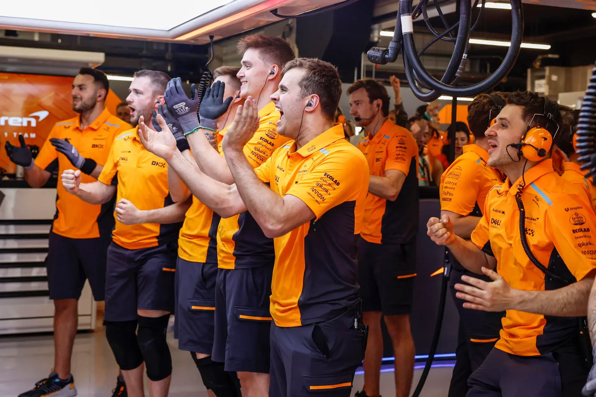 Mclaren mechanics celebrating Lando Norris Pole-Mclaren