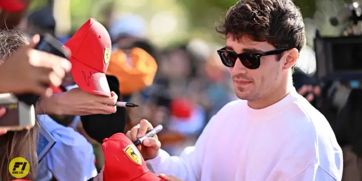 Charles Leclerc signing autographs for the fans