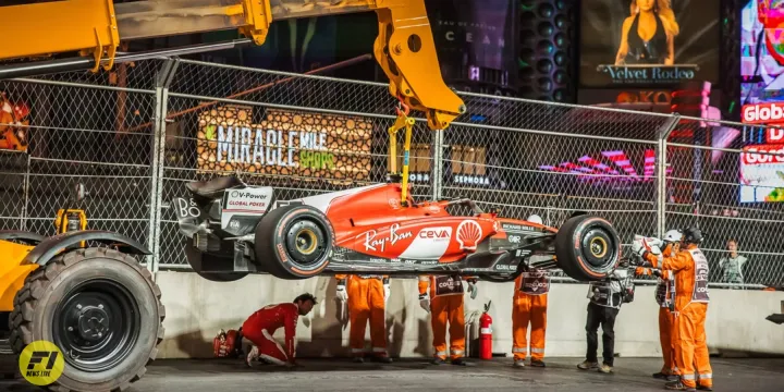 Carlos Sainz checking down his damaged car during Las Vegas GP 2023 - XPB